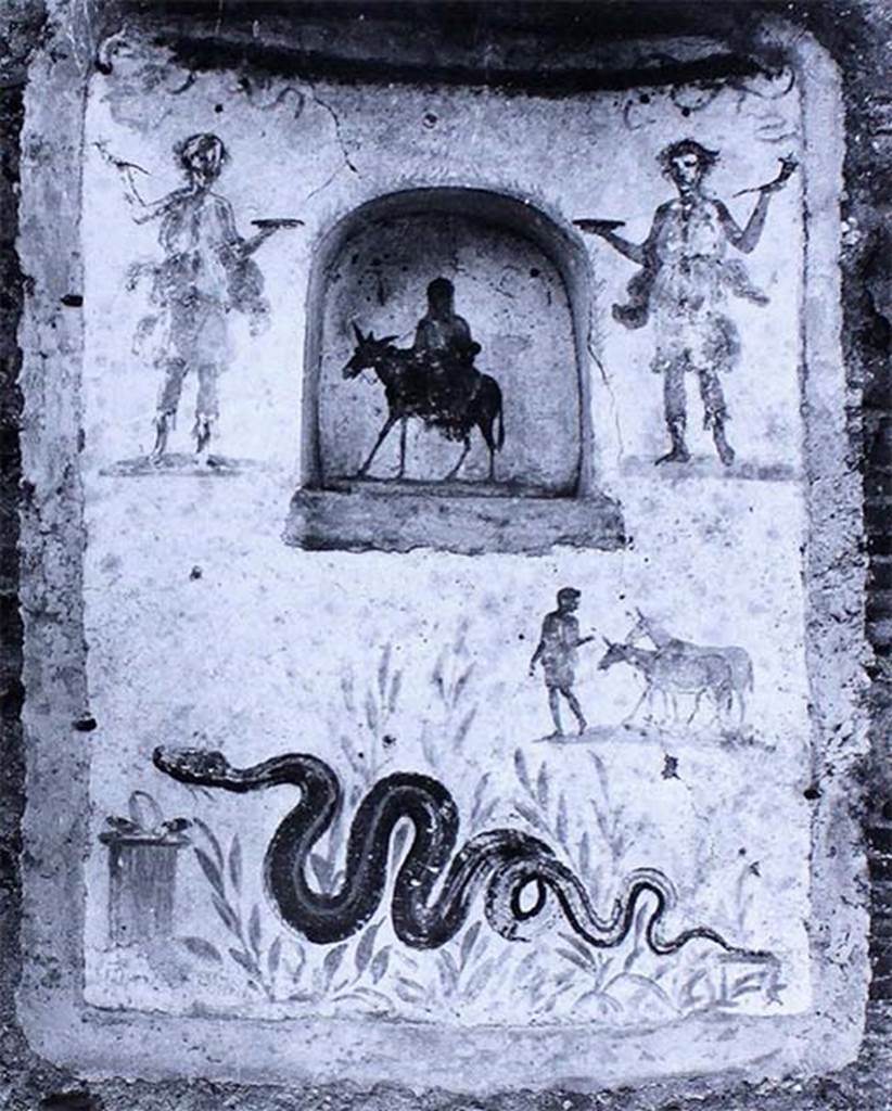 IX.2.24 Pompeii. Old photo of lararium and niche on west wall of stable.
According to Fröhlich, on the lower left was a painted altar with a snake approaching, through plants, from the right.  
Above right was a man leading two donkeys.  
In the niche was a female figure on a donkey, perhaps Vesta, Epona or Isis-Epona. 
Two Lares were at the top, one on either side of the niche.  
See Fröhlich, T., 1991, Lararien und Fassadenbilder in den Vesuvstädten.  Mainz: von Zabern.  (L99: p.293, T. 42,3).
