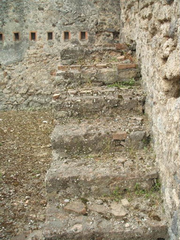 IX.2.24 Pompeii.  May 2005.  Staircase on west wall.