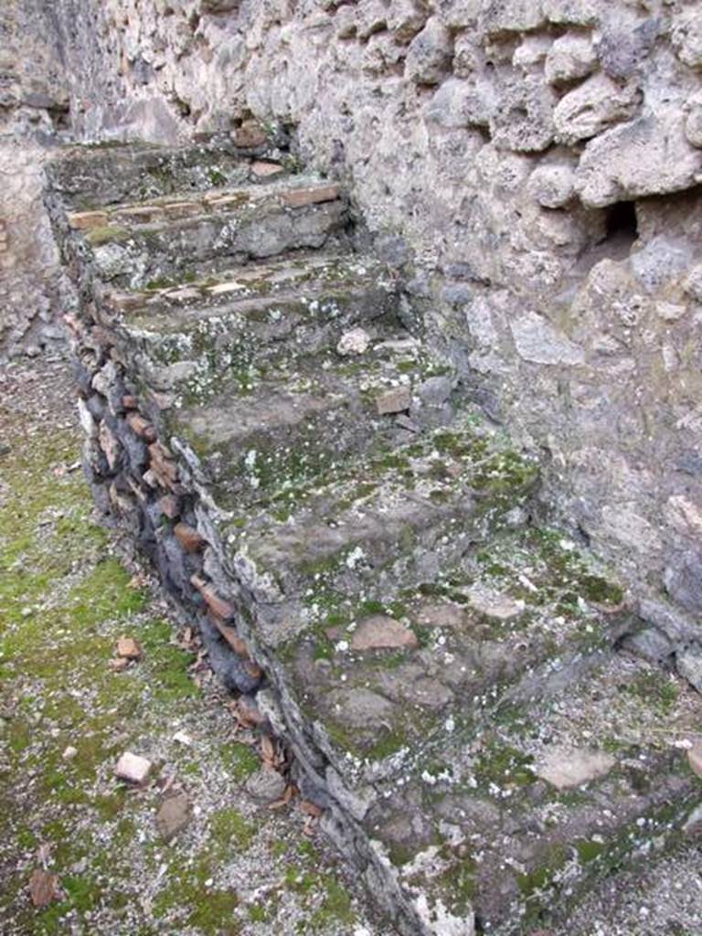 IX.2.24 Pompeii.  March 2009.   Staircase on west wall of yard area.