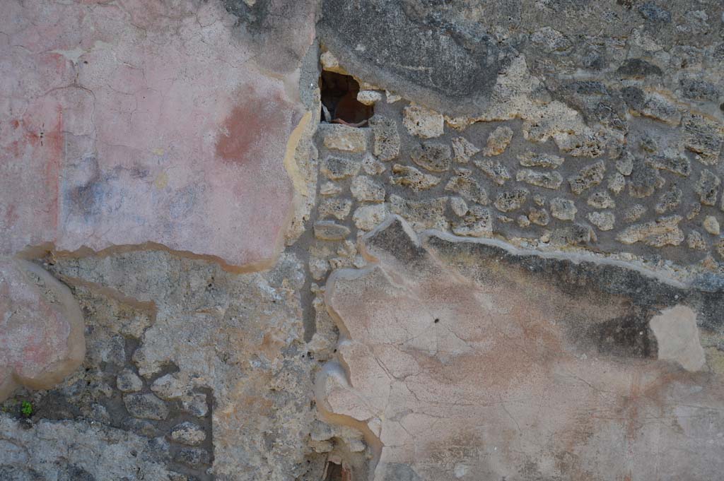 IX.2.26 Pompeii. March 2019. 
Front façade, west side of entrance doorway, front wall at division between IX.2.26, on left, and IX.2.27, on right.
Foto Taylor Lauritsen, ERC Grant 681269 DÉCOR.
