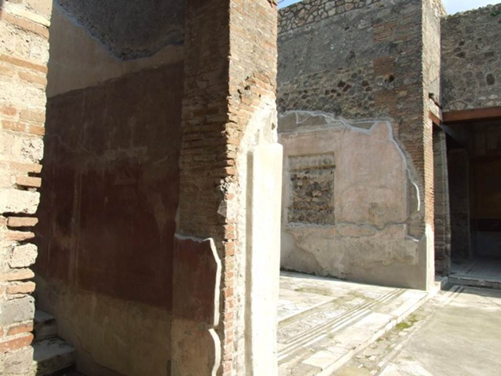 IX.3.5 Pompeii.  March 2009.  Door to steps on east side of atrium, and open entrance to Room 12, tablinum.