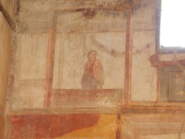 IX.3.5 Pompeii. May 2015. Room 13, painting of figure at upper east end of south wall. Photo courtesy of Buzz Ferebee.

