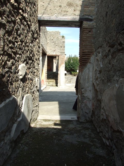 IX.3.5 Pompeii.  March 2009.  Room 2.  Stairs to upper floor, and room looking east towards atrium.