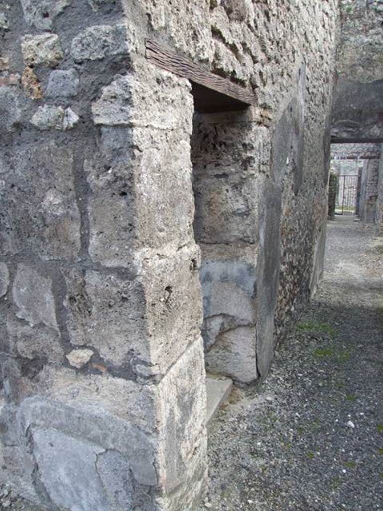 IX.3.15 Pompeii.  March 2009.   Small Door on west side of room 8, from corridor.