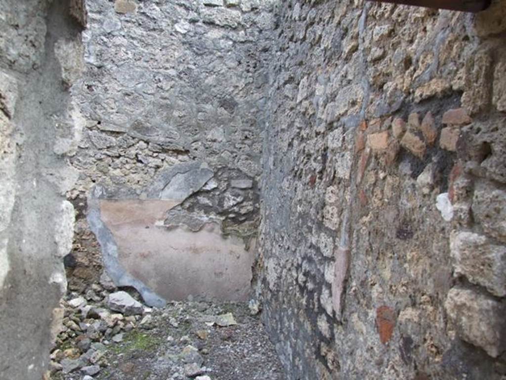IX.3.15 Pompeii. March 2009. Room 10, south-west corner, looking south. The high zoccolo of cocciopesto can be seen on the south wall, the blocked doorway to room 9, on the right.
