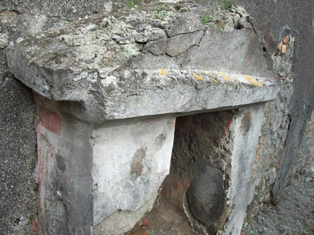 IX.3.15 Pompeii. March 2009. Room 12, remains of pediment of lararium.