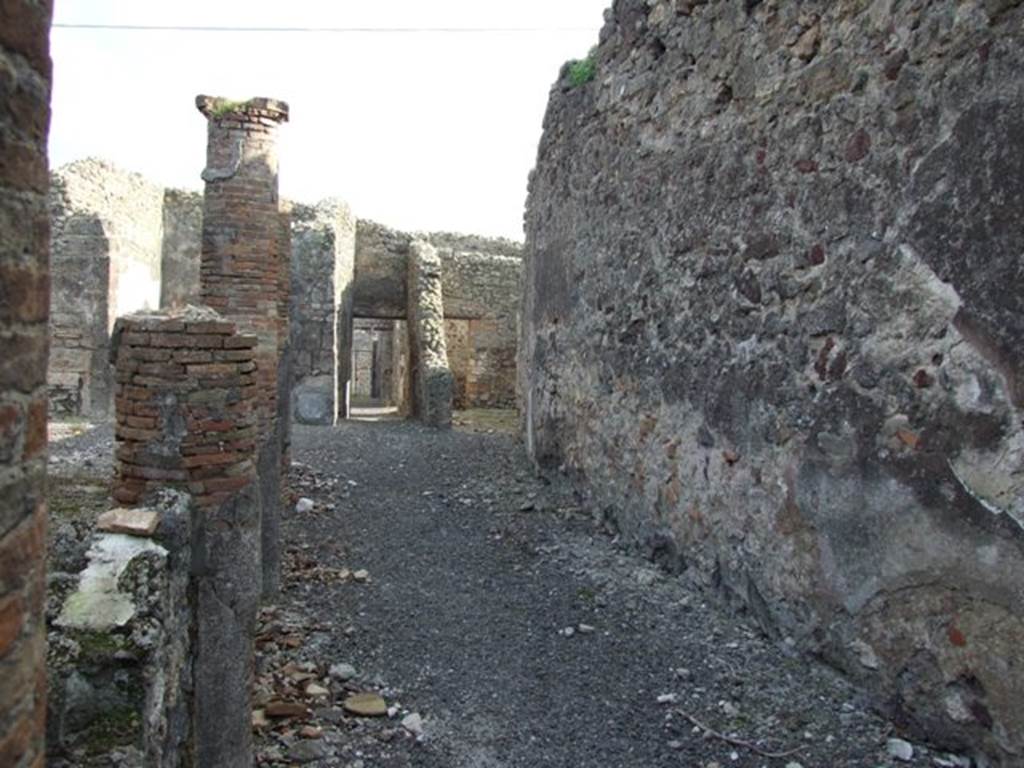 IX.3.15 Pompeii. March 2009. Room 12, looking south along west portico towards front of house.  