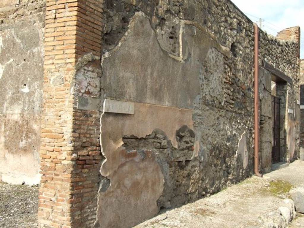 IX.3.18  Pompeii. March 2009.  Wall between IX.3.18 and IX.3.19, site of graffiti.
