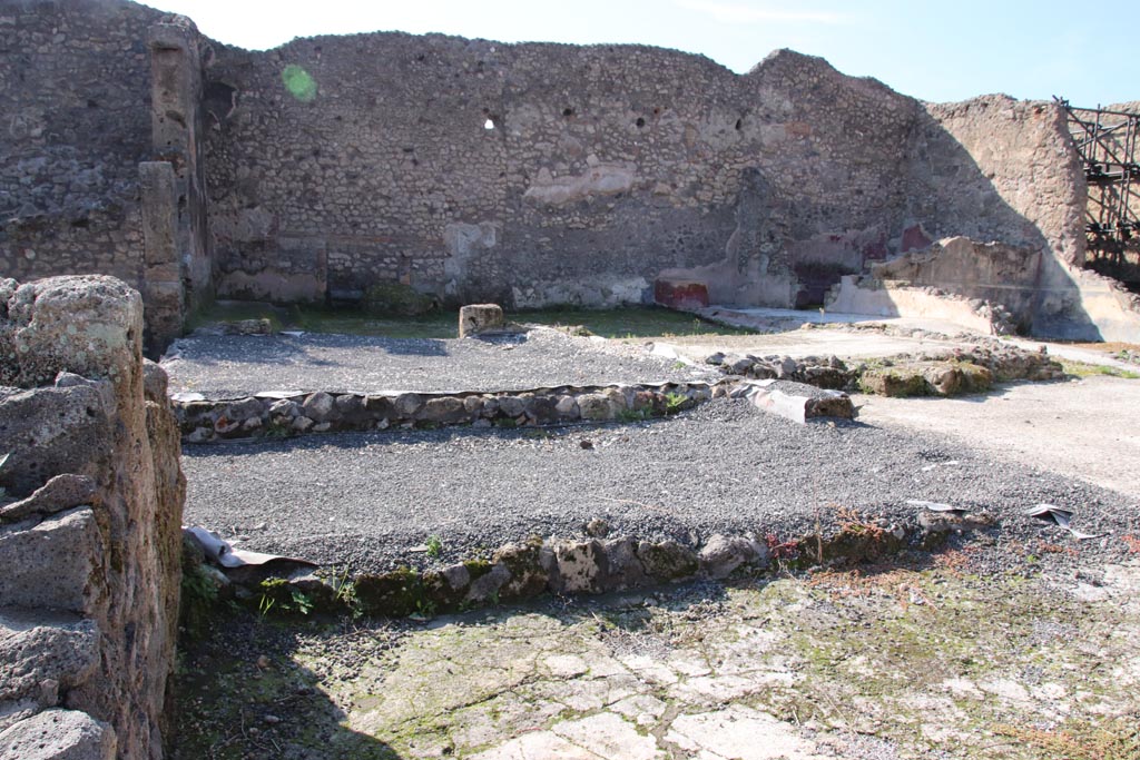 IX.3.22 Pompeii. December 2018. 
Looking towards room in north-west corner, with red painted wall decoration. Photo courtesy of Aude Durand.
