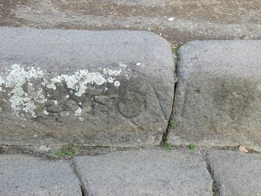 EX.K.QUI cut into the edge of the pavement outside IX.4.1 Pompeii. Ex Kalendis Quictilibus which means “From the first day of July”.  According to Mau this apparently relates to the laying of pavement and must go back before 44BC when the month QUINCTILUS was changed to IULIUS, our July.  Pompeii was therefore paved before 44BC.  See Mau, A., 1907, translated by Kelsey F. W. Pompeii: Its Life and Art. New York: Macmillan. (p.228).