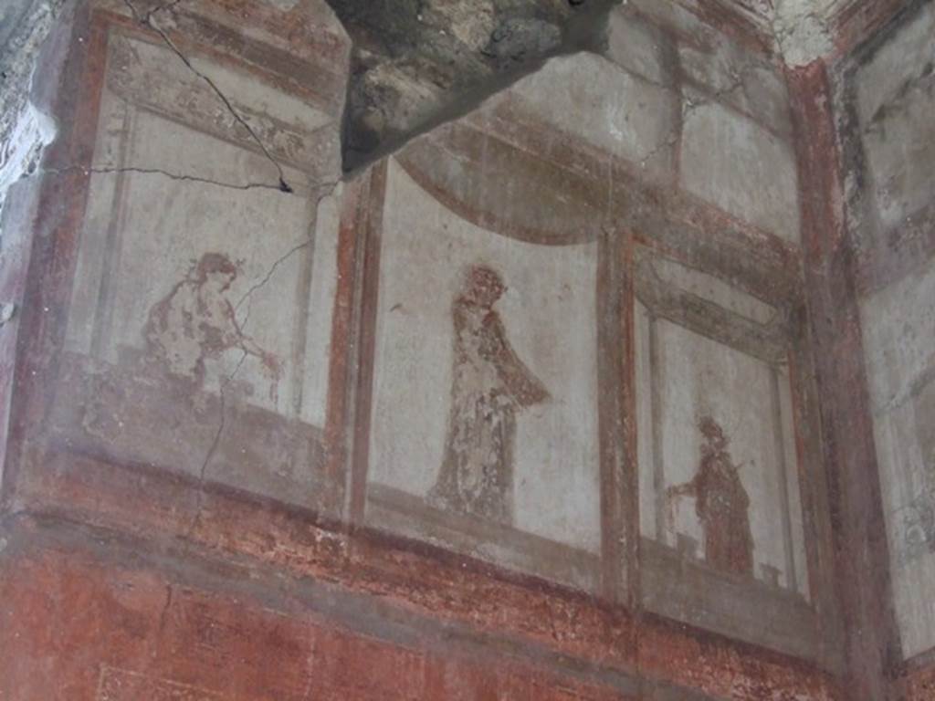 IX.5.6 Pompeii. December 2007. Room i, upper north wall of tablinum. Wall painting of figures or gods at high level.
