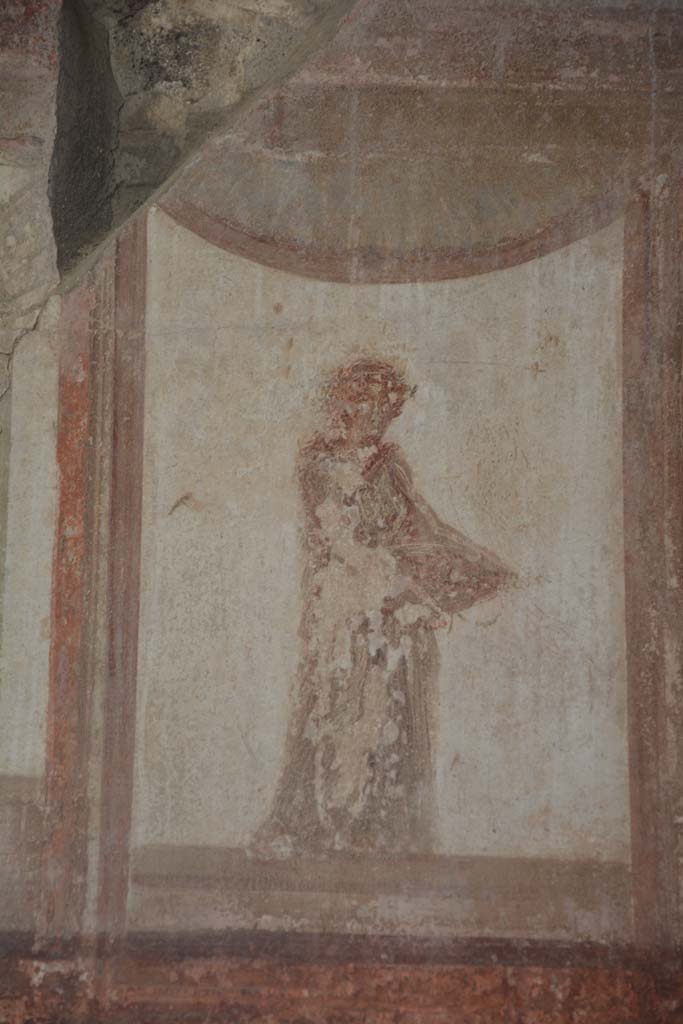 IX.5.6 Pompeii. May 2017. 
Room i, upper north wall in north-east corner, detail of figure in centre.   
Foto Christian Beck, ERC Grant 681269 DCOR.
