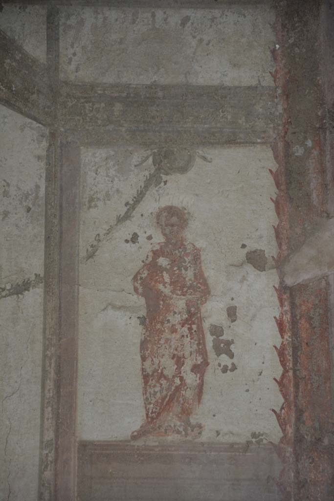 IX.5.6 Pompeii. May 2017. 
Room i, detail of figure above dividing panel on upper east wall towards north end.     
Foto Christian Beck, ERC Grant 681269 DCOR.
