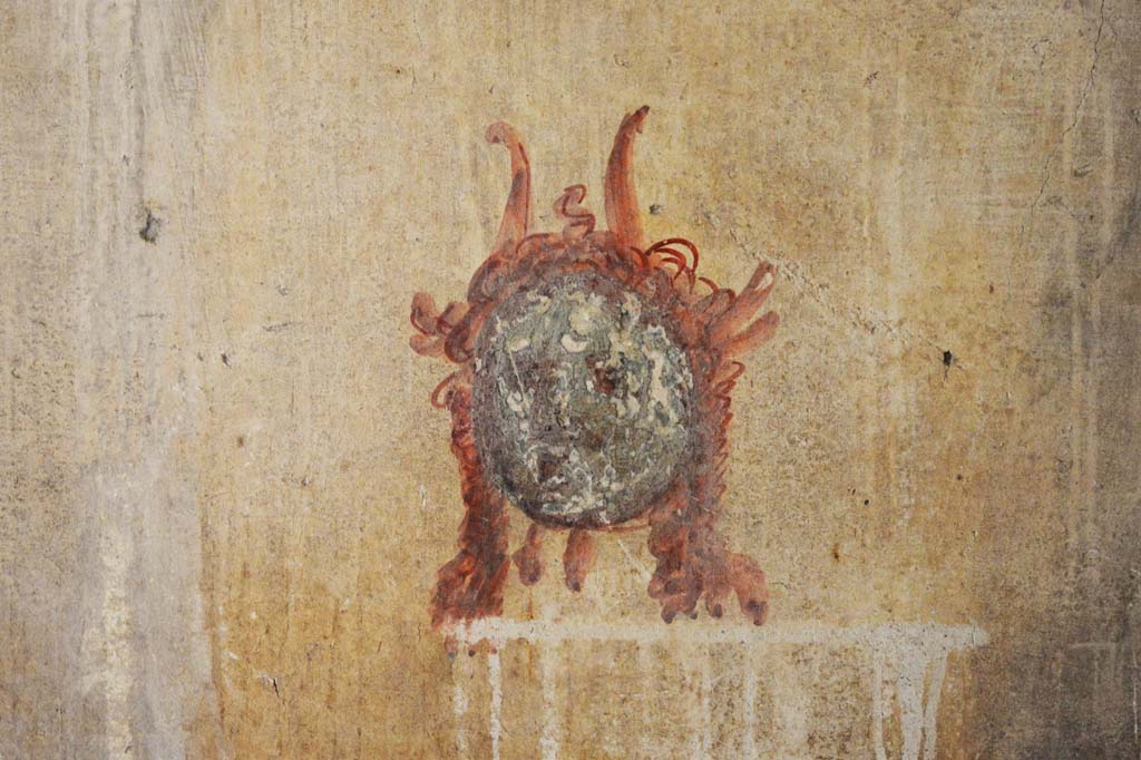 IX.5.6 Pompeii. May 2017. Room k, painted mask from west wall at south end. 
Foto Christian Beck, ERC Grant 681269 DCOR.

