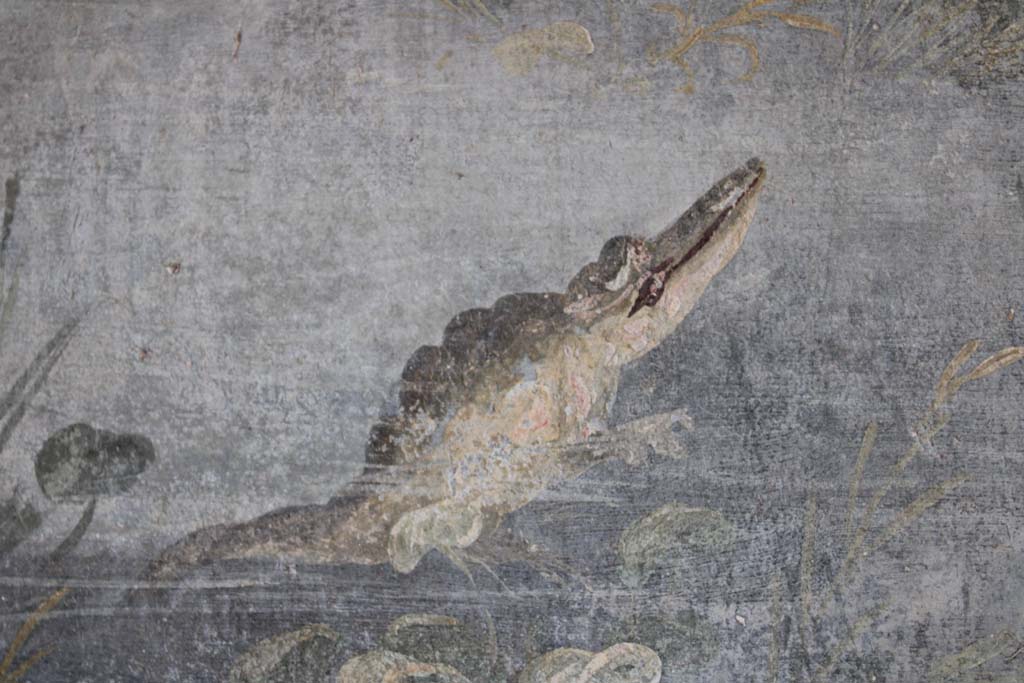 IX.5.9 Pompeii. May 2019. Room l (L), detail of crocodile from east end of north wall.   
Foto Christian Beck, ERC Grant 681269 DCOR.
