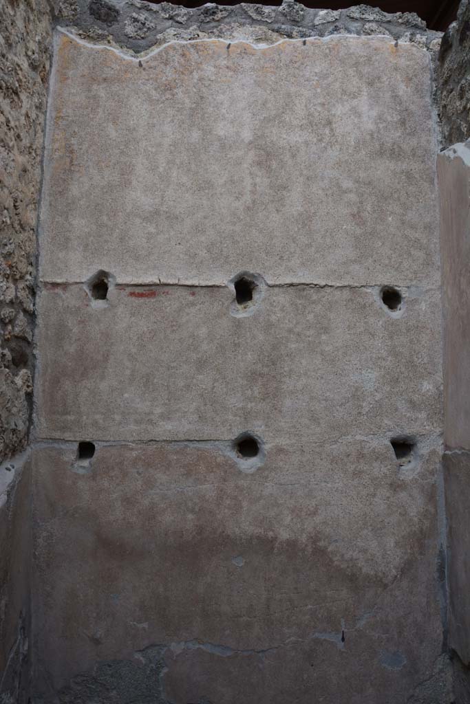 IX.5.9 Pompeii. March 2017. Room h, looking towards east wall with holes for shelving supports.
Foto Christian Beck, ERC Grant 681269 DCOR.

