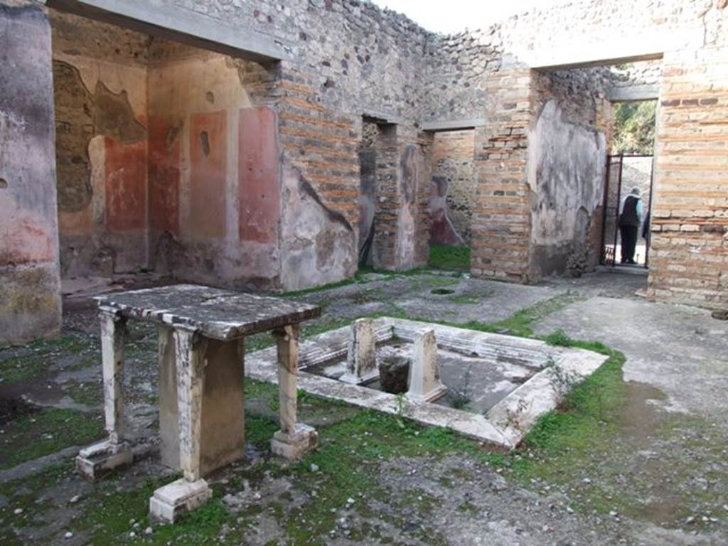 IX.5.11 Pompeii. December 2007. Room b, atrium. Looking north-west towards rooms e, d, c and entrance corridor a.