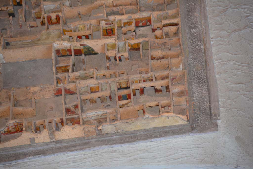 IX.5.11-13 Pompeii. July 2017. Looking west towards rooms in north-east corner of insula, lower right.
From cork model in Naples Archaeological Museum.
Foto Annette Haug, ERC Grant 681269 DÉCOR.
