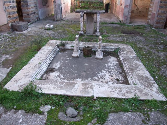 IX.5.11 Pompeii. December 2007. Room 1, marble impluvium in atrium. 
