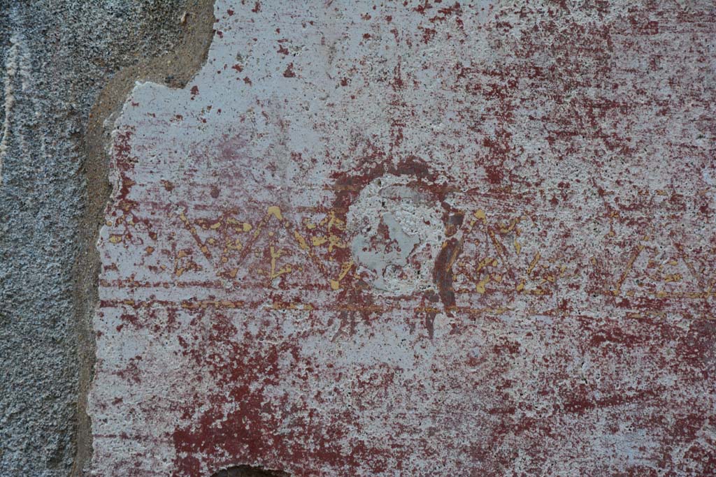 IX.5.11 Pompeii. March 2017. Room I (L), detail of painted mask from zoccolo at north end of east wall.
Foto Christian Beck, ERC Grant 681269 DÉCOR.

