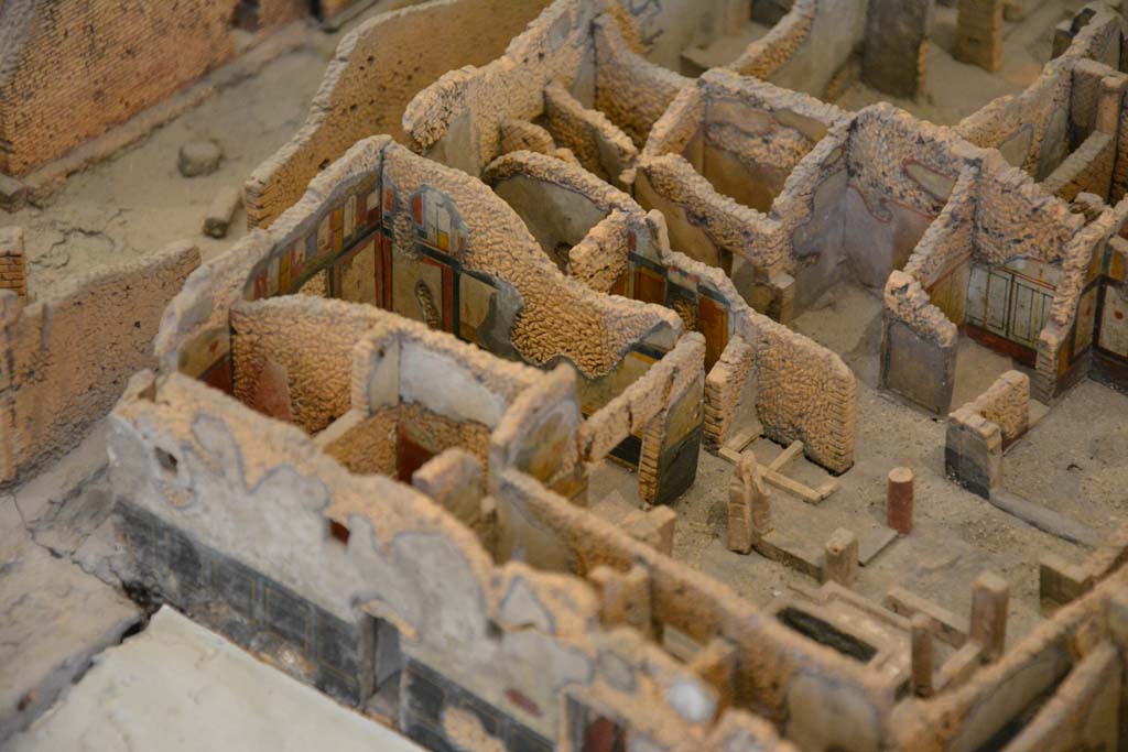 IX.5.18 Pompeii. July 2017. Looking north-west across rooms in south-west corner of insula.
From cork model in Naples Archaeological Museum.
Foto Annette Haug, ERC Grant 681269 DÉCOR
