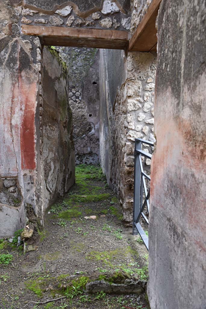 IX.5.18 Pompeii. March 2017. Room c, looking east from entrance at IX.5.19.
Note the remains of two walls which would have formed a small square room at the base of the stairs to the upper floor.
Foto Christian Beck, ERC Grant 681269 DÉCOR.
