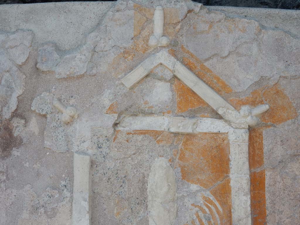 IX.7.2 Pompeii. June 2019. Detail of top of furnace decorated with phallic emblems in stucco.
Photo courtesy of Buzz Ferebee.
