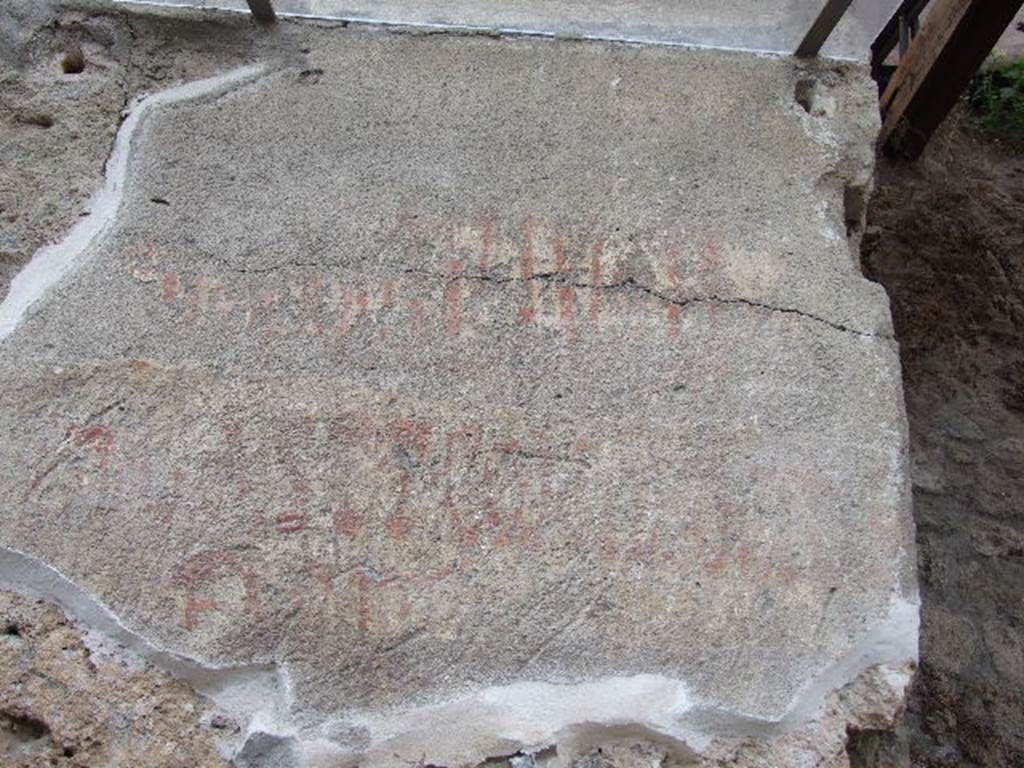 IX.7.2 Pompeii. December 2006. Graffiti on west side of entrance – CIL IV 7817.  See Varone, A. and Stefani, G., 2009. Titulorum Pictorum Pompeianorum, Rome: L’erma di Bretschneider, (p.386)  According to Epigraphik-Datenbank Clauss/Slaby (See www.manfredclauss.de), it read -
P(ublium)  Vedium  Nummianum 
aed(ilem)  v(iis)  aed(ibus)  s(acris)  p(ublicis)  p(rocurandis)  Coniunctus 
facit      [CIL IV 7817]
