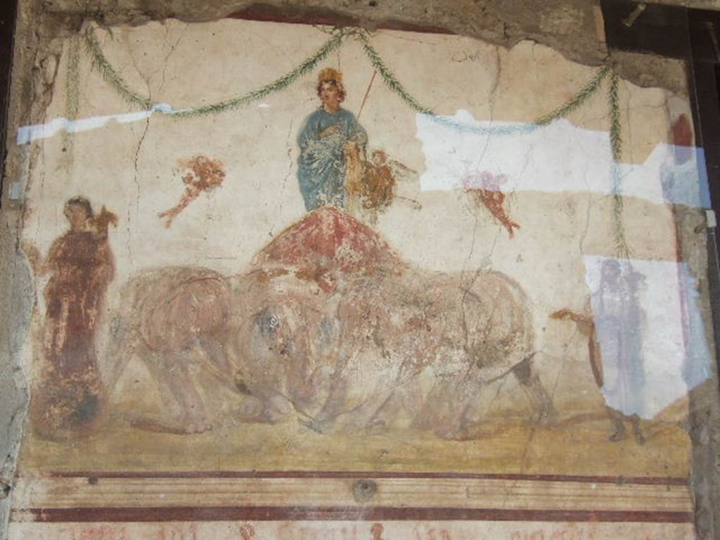 Outside IX.7.7 and IX.7.6. December 2006. Venus riding in a chariot, being pulled by elephants. 

