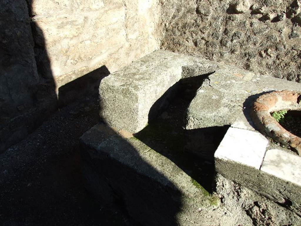 IX.7.13 Pompeii. December 2006.  Hearth at end of counter.