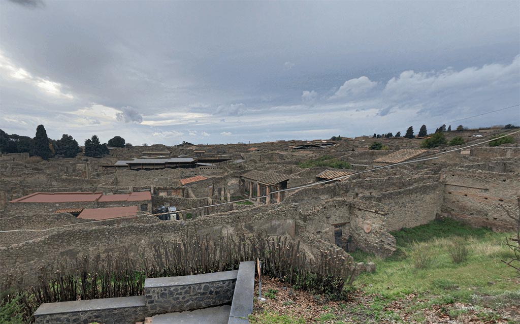 IX.7.12, 14 or 16 Pompeii. 2017. 
Looking down from the Casina dell’Aquila towards an aedicula lararium in the north-west corner of the garden area “e” , on the right in the photo.
Photo courtesy of Google Earth.
Due to the fact that the area has not been fully excavated, it is not known whether the garden area belongs to IX.7.12, 14 or IX.7.16.

