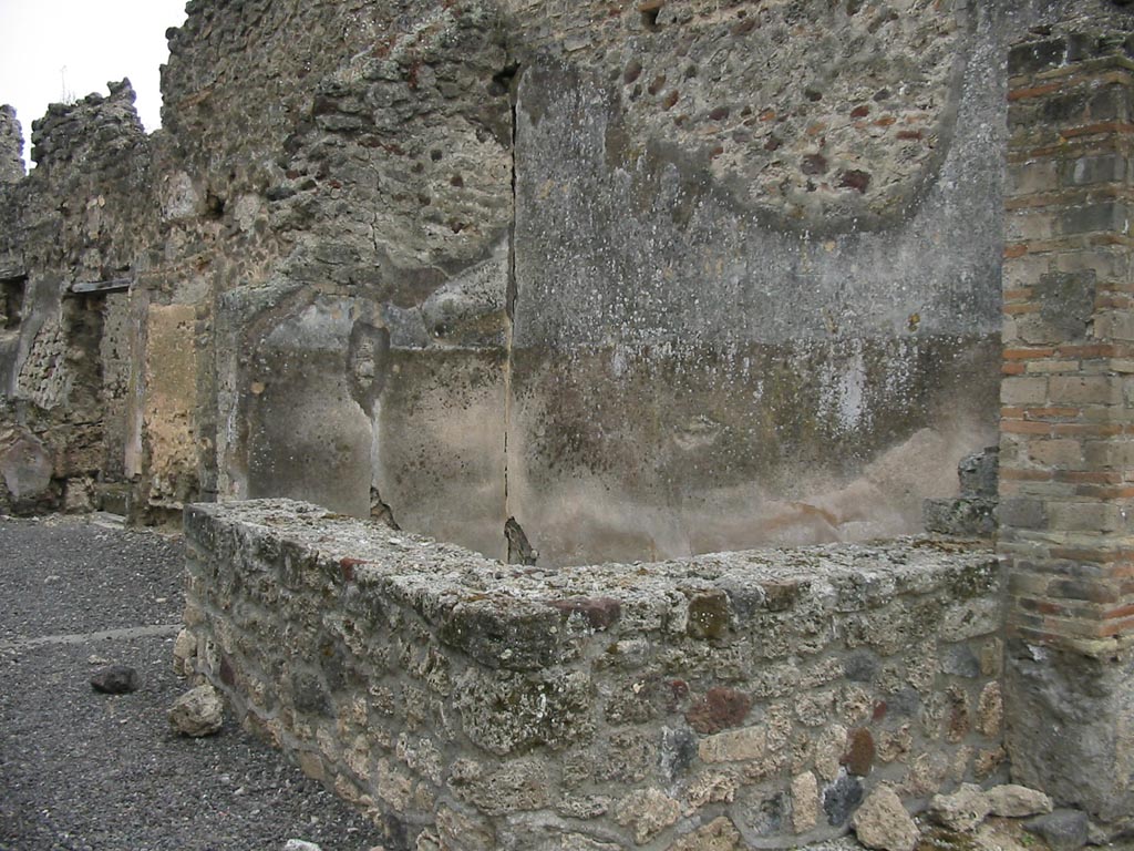 IX.7.22 Pompeii. May 2003. Entrance doorway, looking south-west across counter. Photo courtesy of Nicolas Monteix.