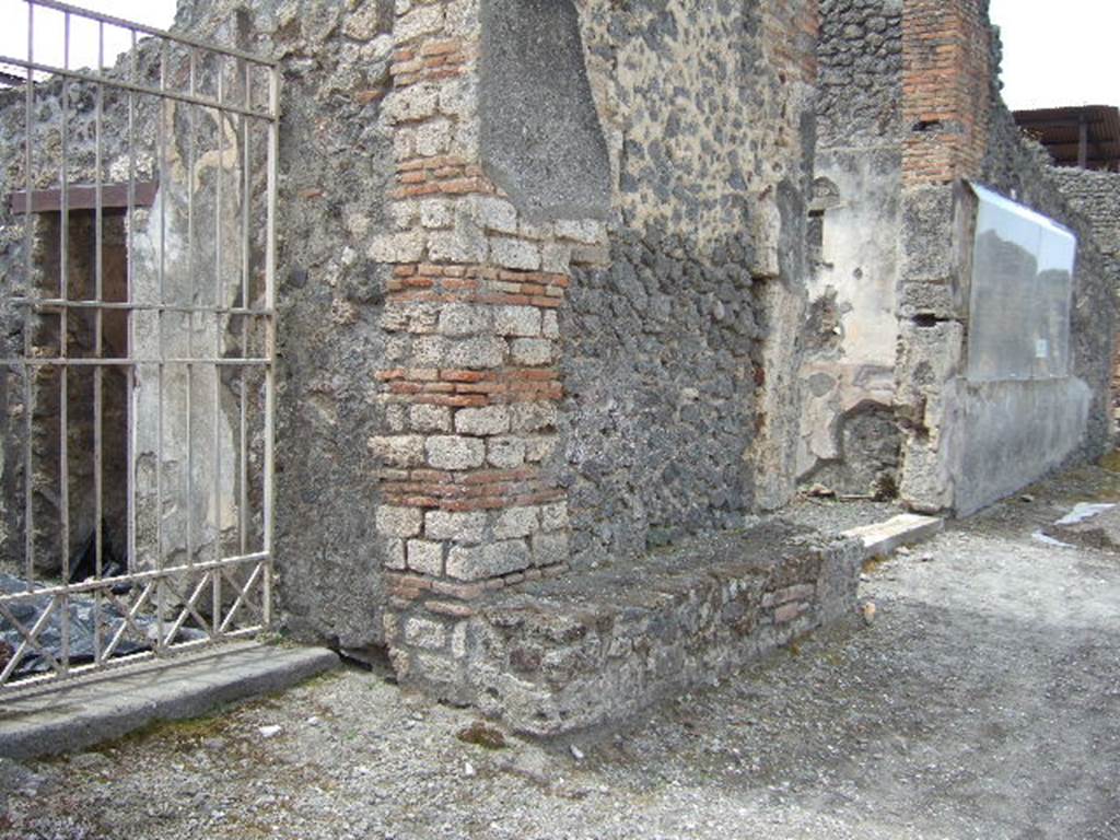 IX.8.3 Pompeii. May 2006. West side of entrance with seat and doorway to IX.8.2.
