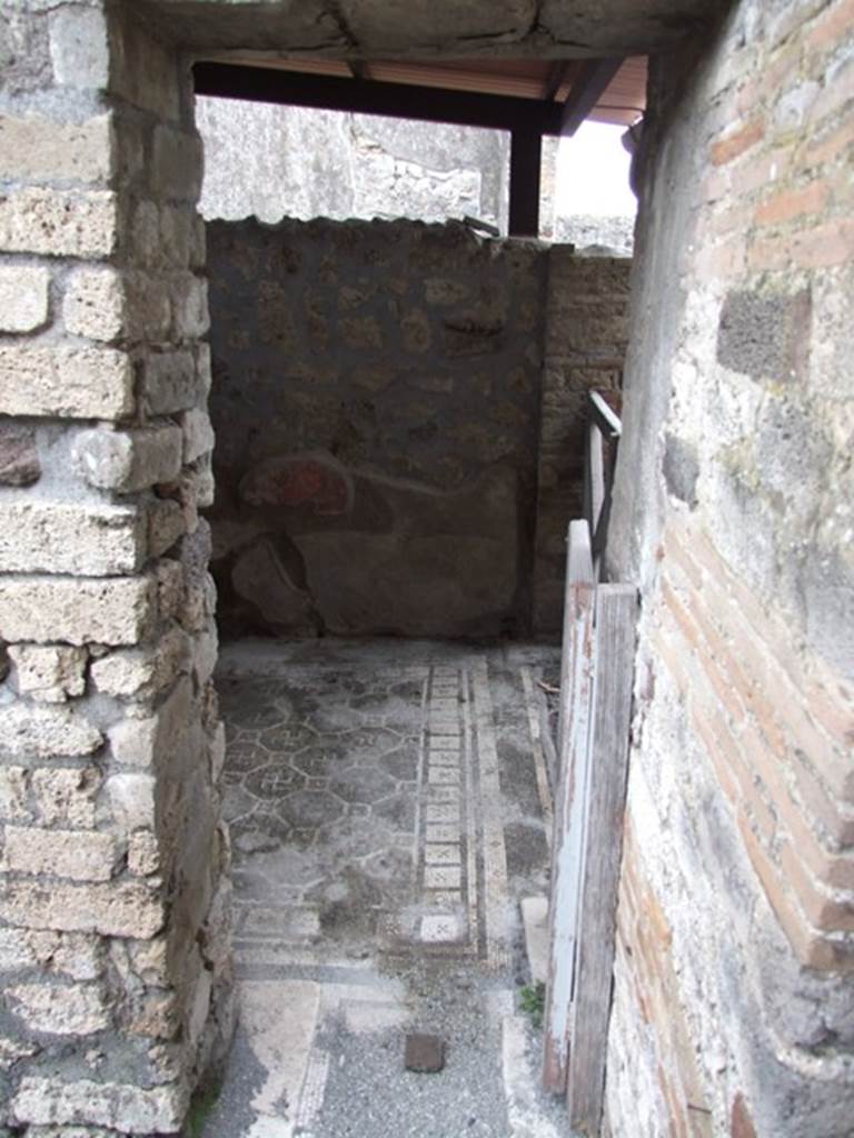 IX.8.6 Pompeii. March 2009. Room 54, east wall with small door to room 55, at south end of tablinum of IX.8.3.
