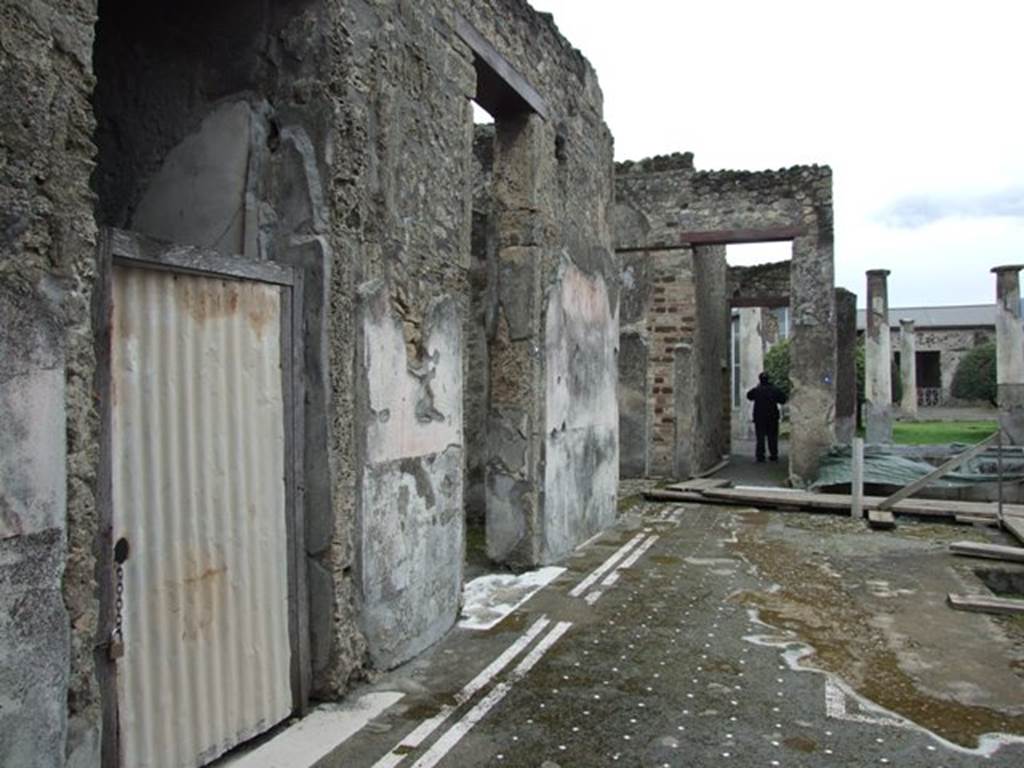IX.8.6 Pompeii. March 2009.  Looking south along east side of atrium.