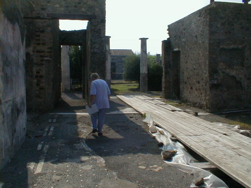 IX.8.6 Pompeii.  September 2004.  East side of atrium looking south.
