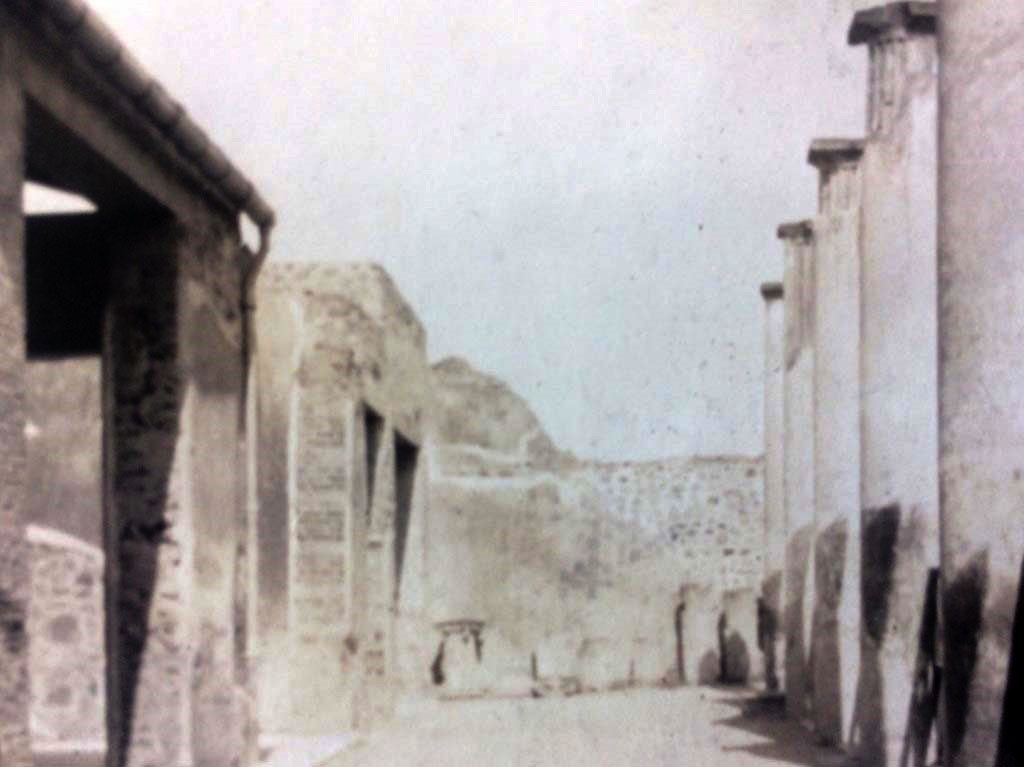 IX.8.6 Pompeii. c.1920’s. Looking east across north portico, with doorway to room 11, centre right.
Photo courtesy of Rick Bauer.
