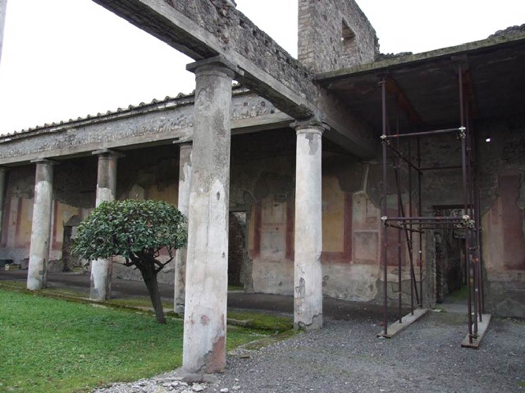 IX.8.6 Pompeii. March 2009. North-west corner of portico, looking towards west wall.