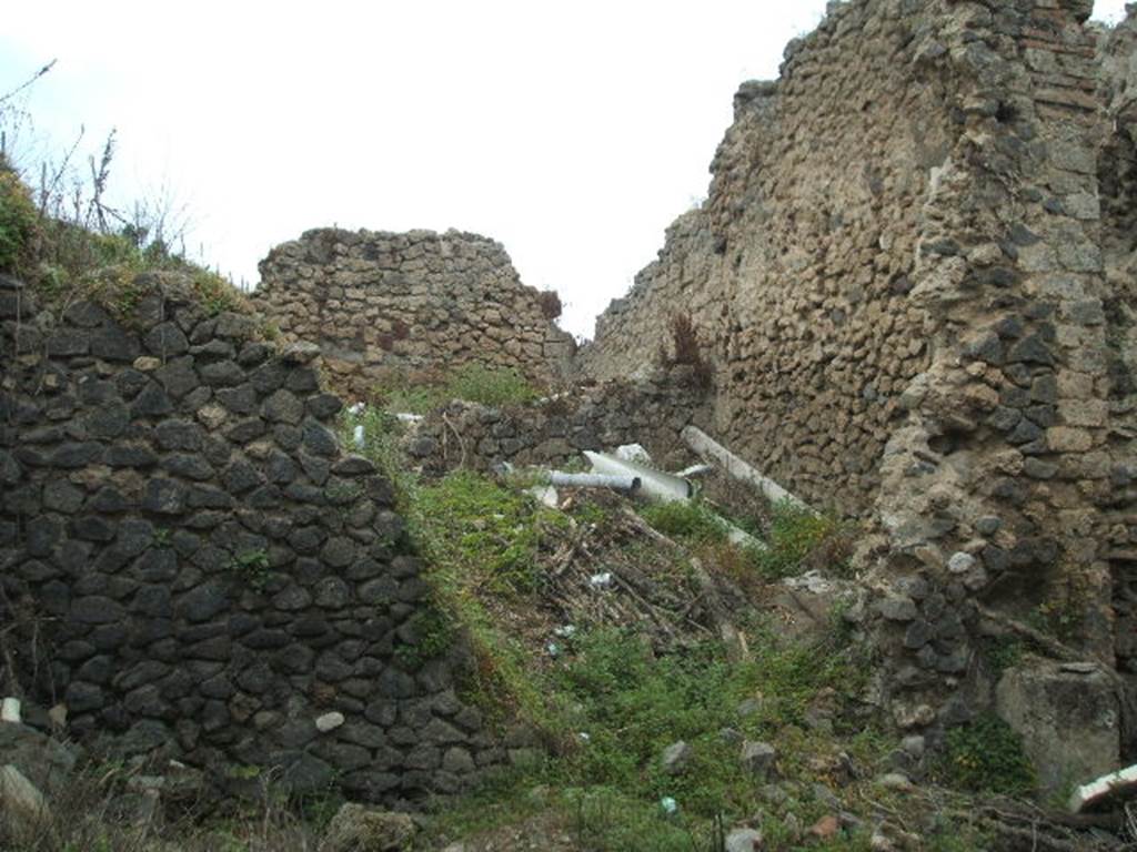 IX.8.8 Pompeii. May 2005. Entrance.
According to NdS, on the east side of the insula called “of the Centenary” written in red but nearly vanished was the recommendation - 

C……STIVM BALBVm
/
priMIGENIA ROgat
/
…AFRA…      [CIL IV, 3773]

See Notizie degli Scavi, 1888, p.521-2

According to Epigraphik-Datenbank Clauss/Slaby (See www.manfredclauss.de), this read -

Q(uintum) B[ru]ttium Balbu[m]
[6] 
Iul[ia Pri]migenia ro[gat]
[3]a et
M[3]aera       [CIL IV, 3773]