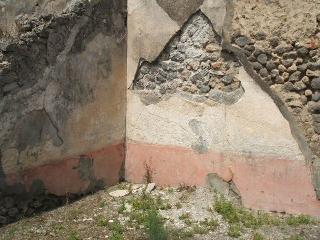 IX.8.c Pompeii. May 2005. North-west corner of second room on north side of north portico.