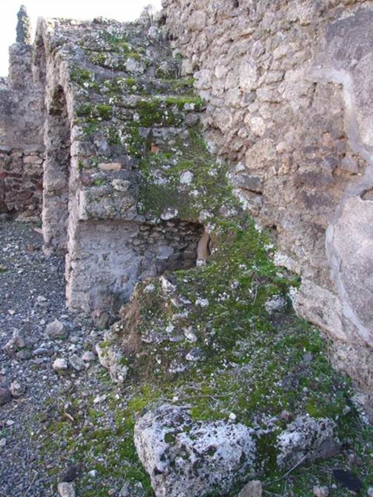 IX.9.2 Pompeii. March 2009. Stairs to upper floor, looking south along west wall.
