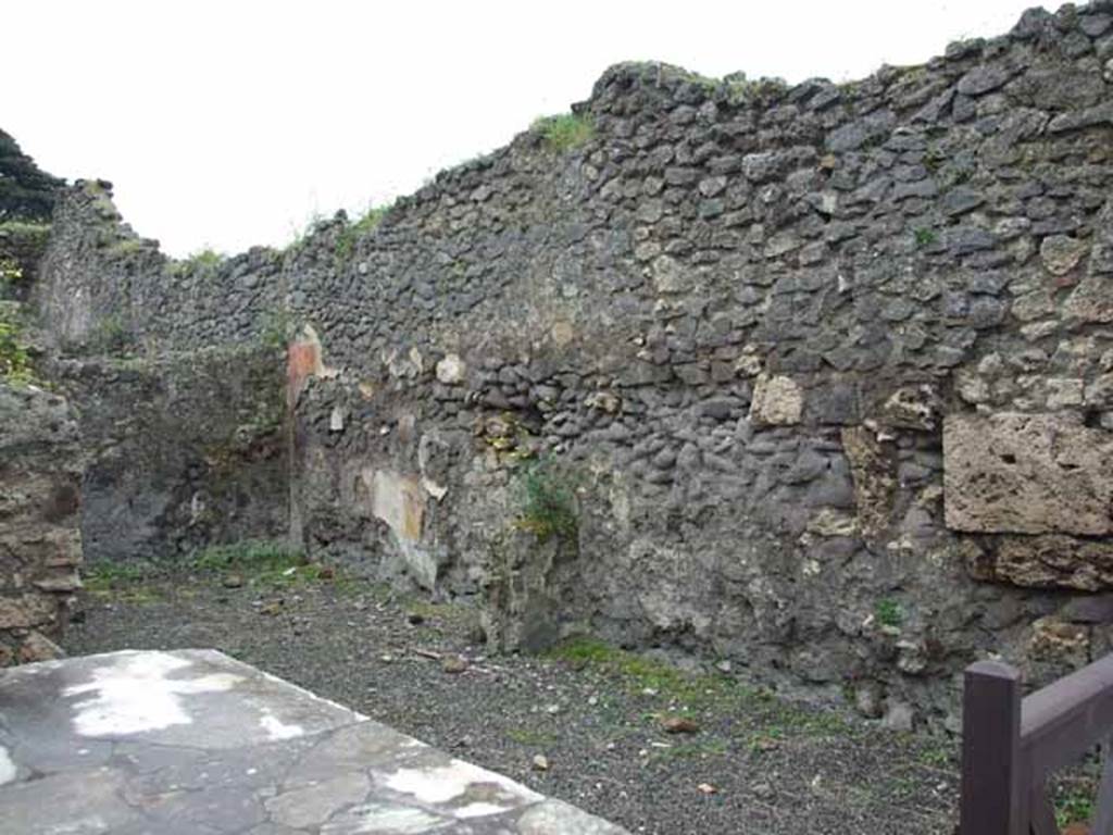 IX.9.8 Pompeii. May 2010. West wall of bar, with rear room. Looking south.