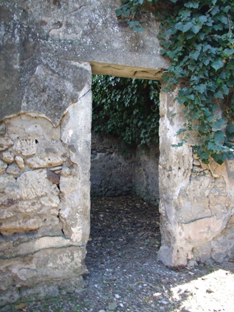 IX.9.11 Pompeii.  March 2009.  Doorway to Room 3. Cubiculum.