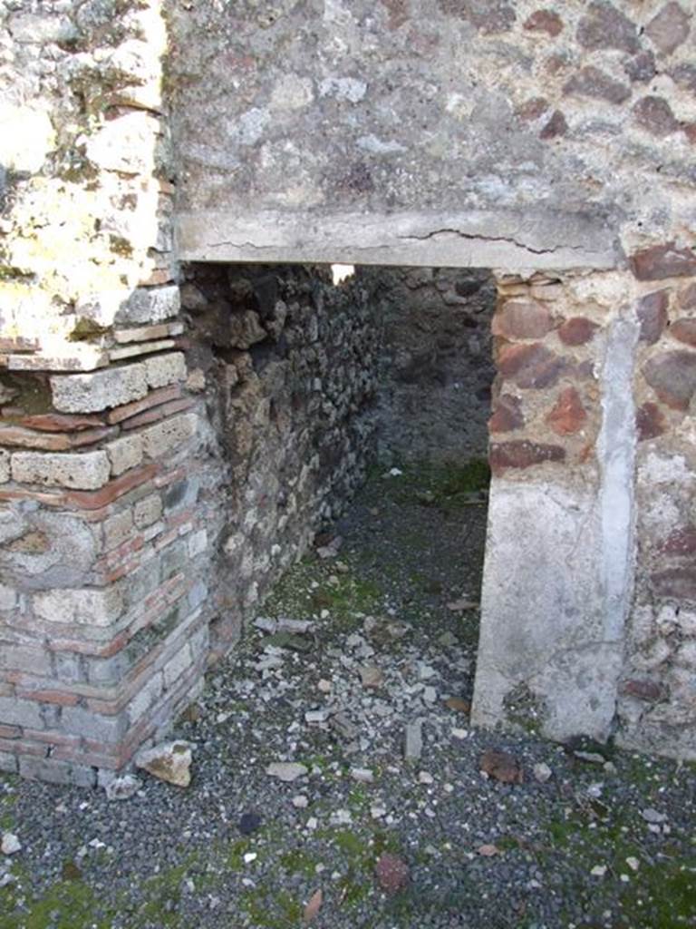 IX.9.a Pompeii.  March 2009. Doorway to Kitchen and Latrine.