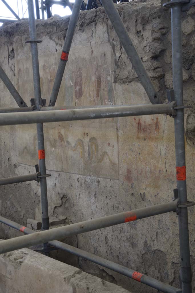 IX.12.6 Pompeii. February 2017. 
Room “n1”, west wall with lararium, and preparatory sketch, on right. 
Photo courtesy of Johannes Eber.


