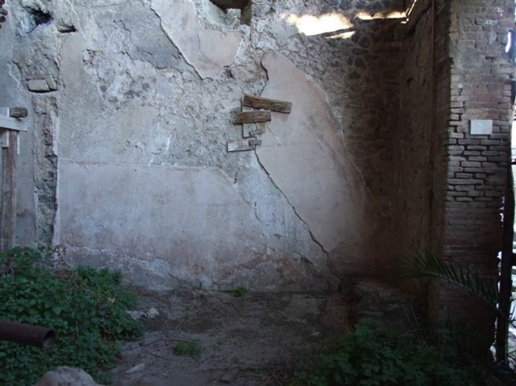 IX.12.7 Pompeii. March 2009. East wall of shop, with the outline of a staircase on the wall.

