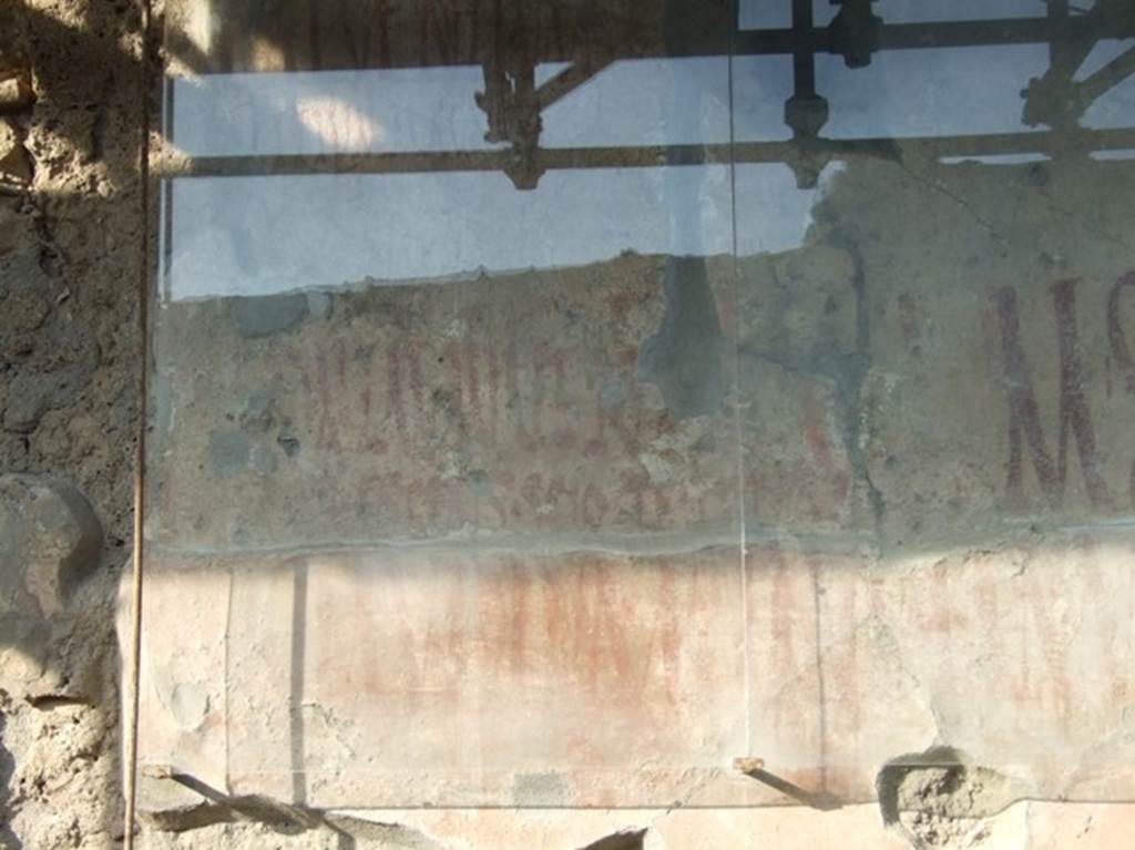 IX.12.7 Pompeii. December 2007. Graffiti between IX.12.6 and IX.12.7
Found here was CIL IV 7910, beneath that CIL IV 7912, under the last two and under CIL IV 7917 was CIL IV 7913. CIL IV 7910, 7912 and 7917 are partly conserved and visible. See Varone, A. and Stefani, G., 2009. Titulorum Pictorum Pompeianorum, Rome: L’erma di Bretschneider (p. 451)
According to Epigraphik-Datenbank Clauss/Slaby (See www.manfredclauss.de), these read as -
L(ucium)  Popidium  Iuvenem 
aed(ilem)  Crescens  scio  te  cupere       [CIL IV 7910]
Ti(berium)  Claudium  Claudian[um         [CIL IV 7912]
M(arcum)  Sextilium  aed(ilem)  o(ro)  v(os)  f(aciatis)  d(ignum)  r(ei)  p(ublicae)        [CIL IV 7917]
C<u=I>spium  [Pa]nsam  IIvir(um)  v(iis)  a(edibus)  s(acris)  p(ublicis)  v(irum)  b(onum)  o(ro)  v(os)  f(aciatis)  d(ignum)  r(ei)  p(ublicae)     [CIL IV 7913]
