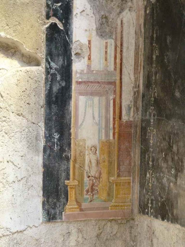 IX.12.9 Pompeii. May 2010. Room 16, east wall, south panel. Architectural painting with figure in doorway