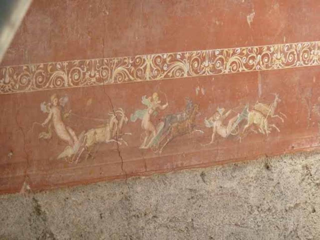 IX.12.9 Pompeii. May 2010. Room 16, north wall, centre panel. Painting of Cupids on chariots pulled by goats.