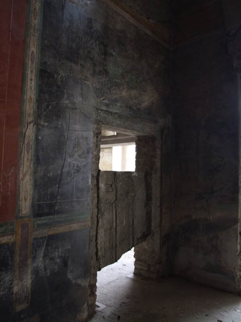 IX.13.1-3 Pompeii. March 2009. Room 13, plaster cast of door in south-east corner.